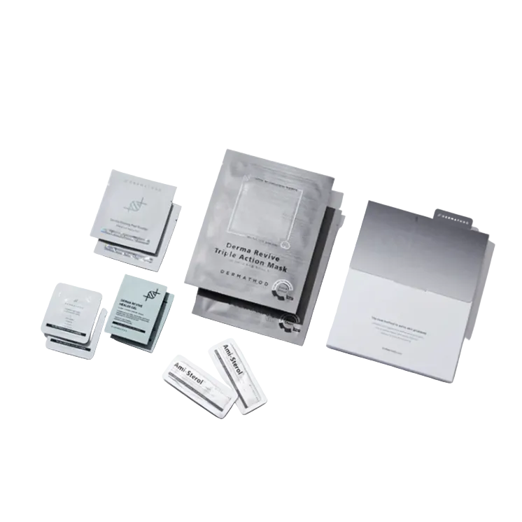 Collection of skincare mask packages on a light gray background